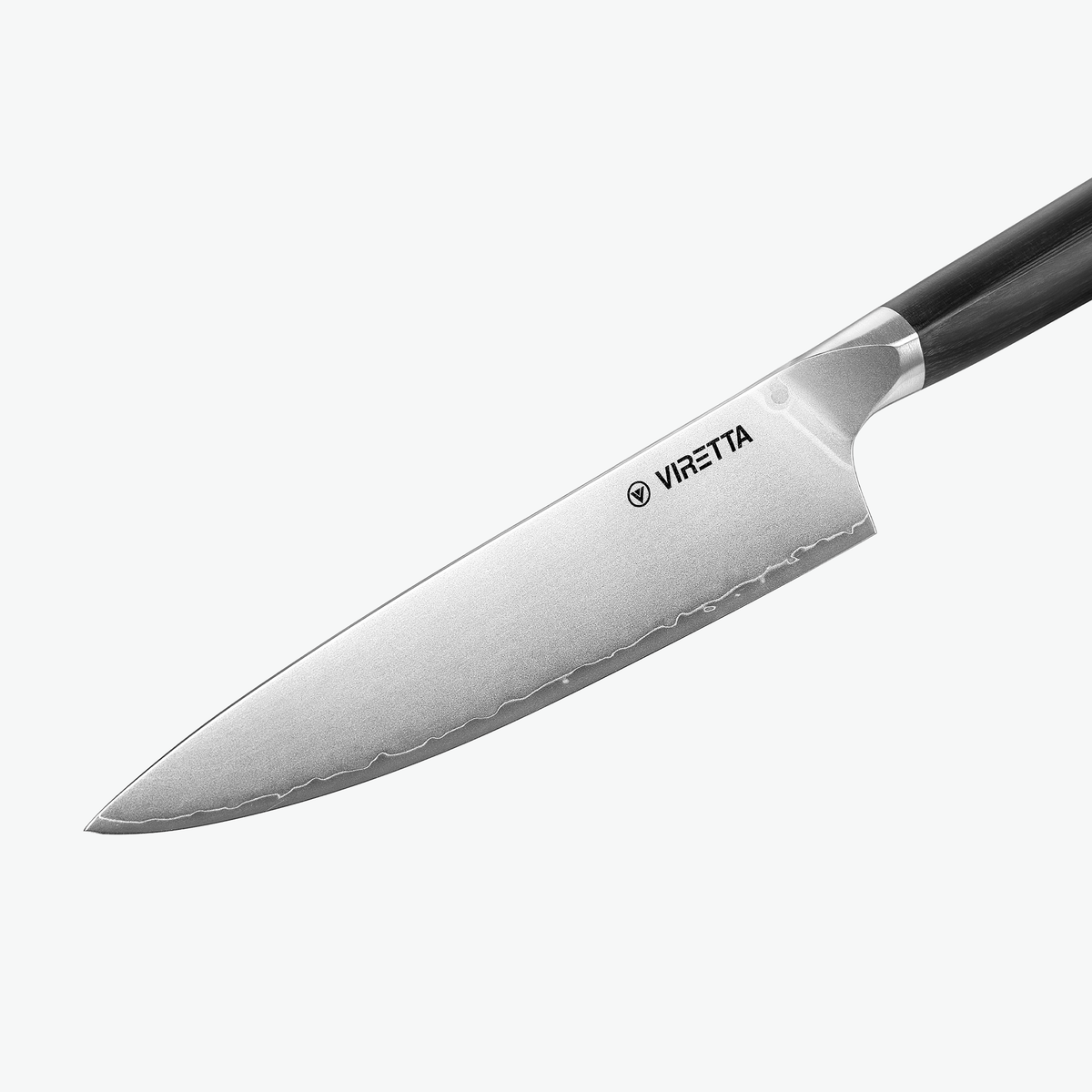 Bølget linje langs æggen på Shōjin Aira kokkekniv, tæt på