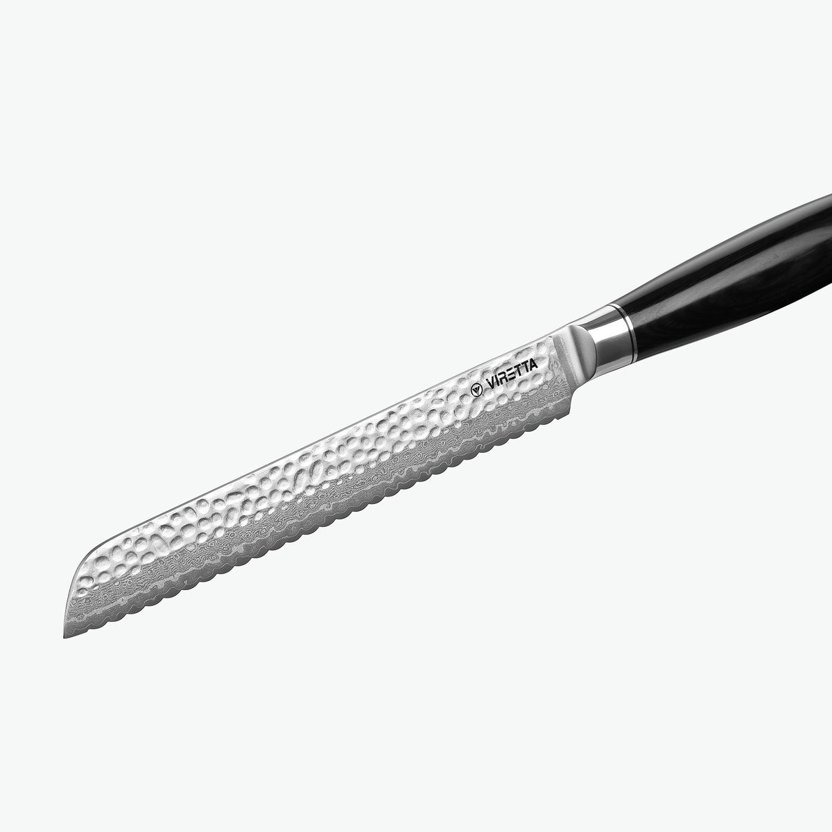 Hamret overflade på klingen af Shōjin Taru brødkniv, tæt på