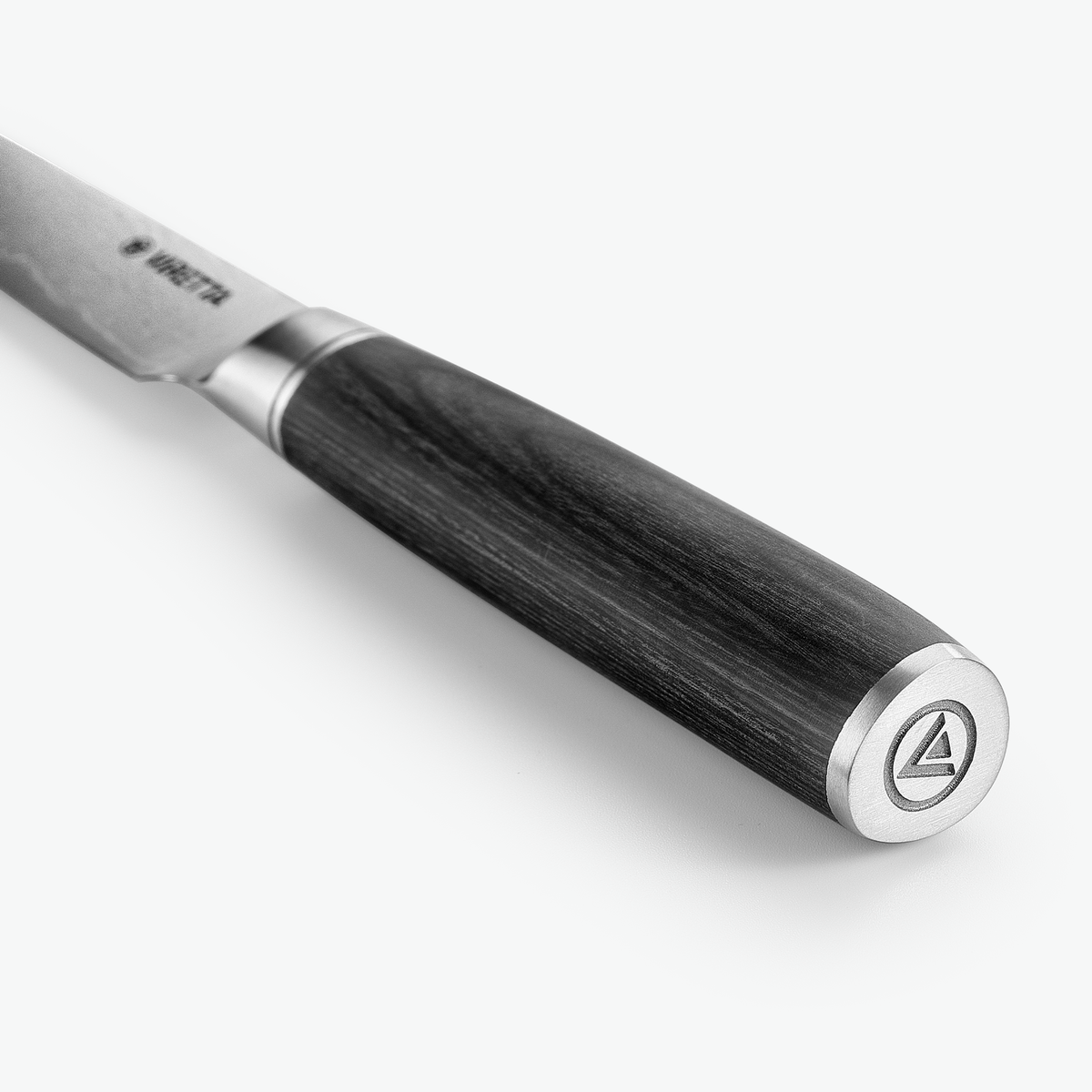 Endekappe i metal med logo på Shōjin Suna universalkniv