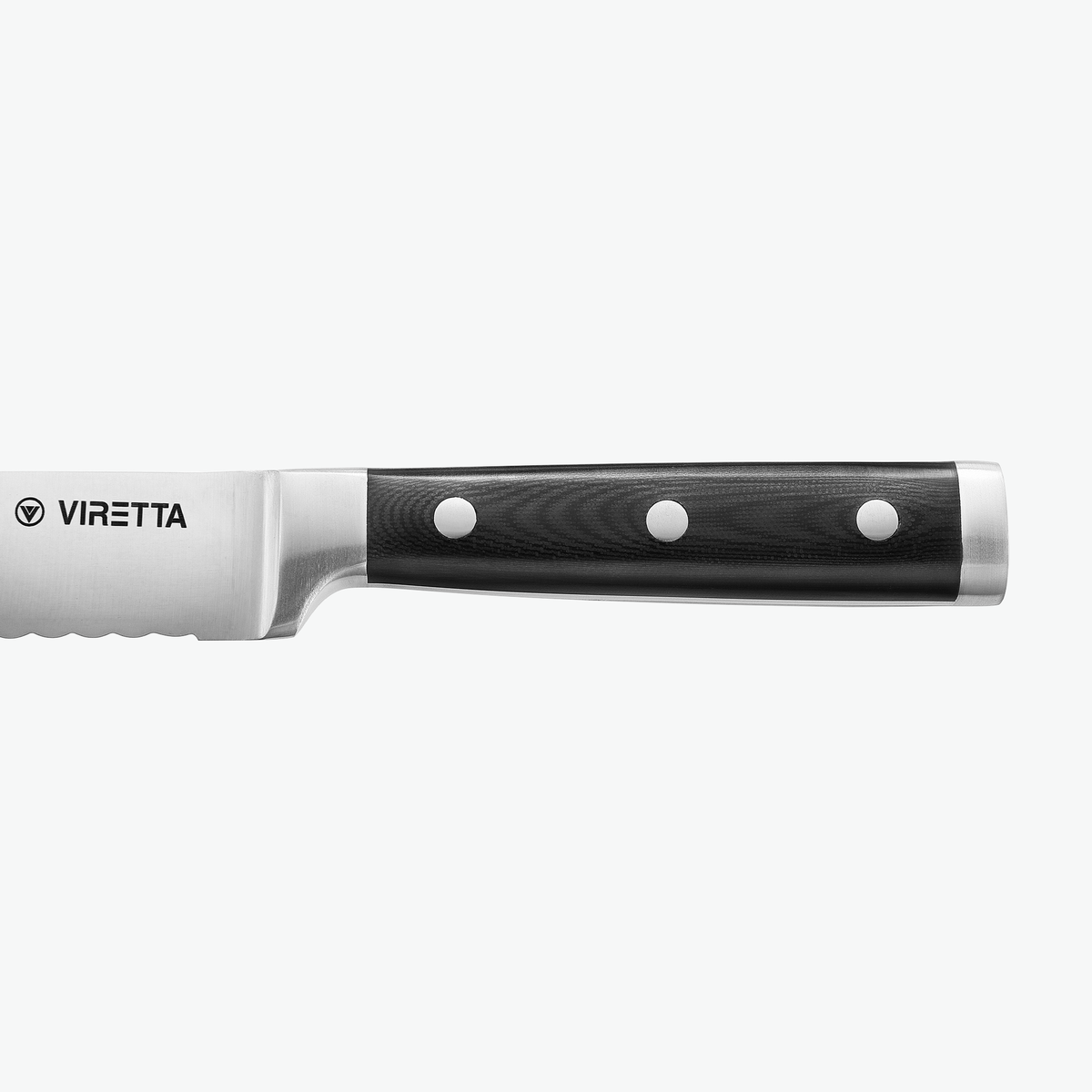 Greb i G-10 med tre nitter på Classic brødkniv, set fra siden