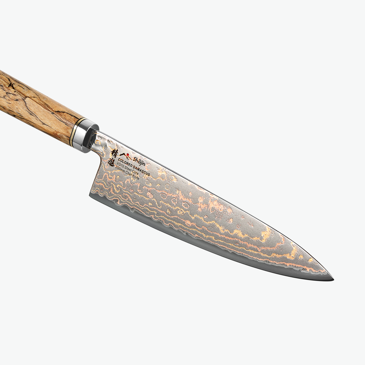 Damask med kobber på klingen af Shōjin Akari kokkekniv, tæt på
