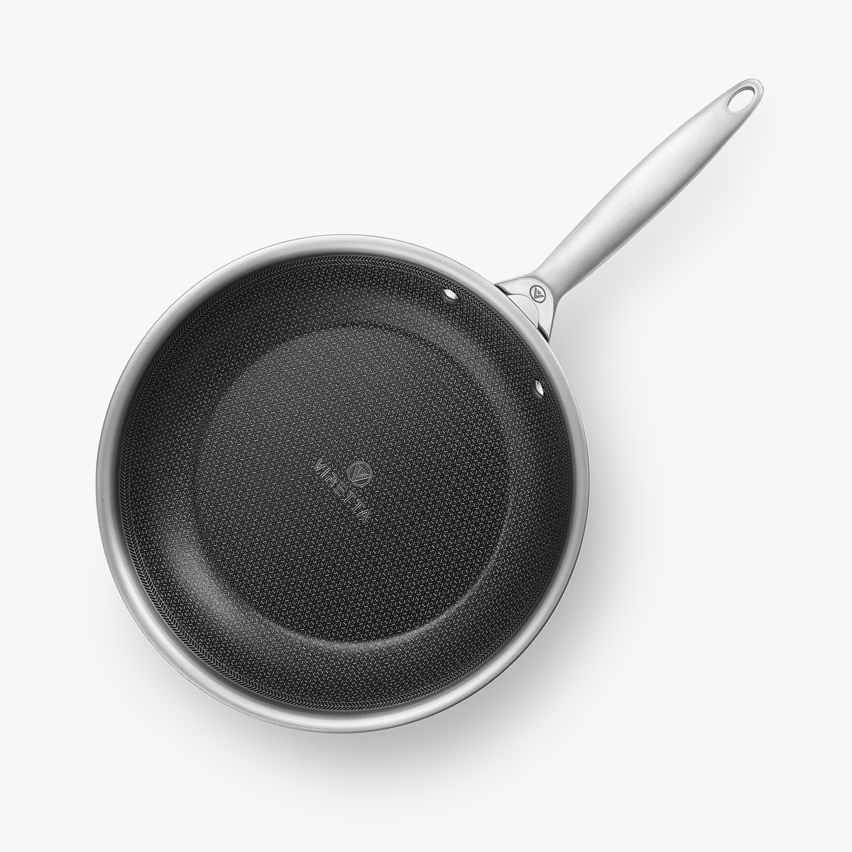Stegepande i 3-Ply Hybrid, Ø28 cm, set ovenfra med det sekskantede mønster
