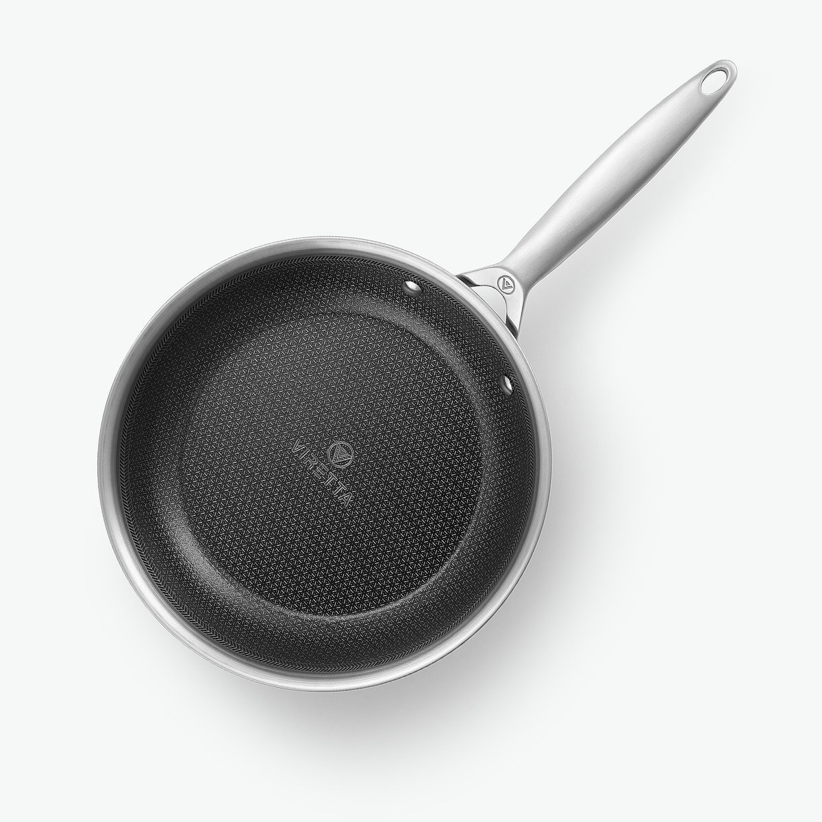 Stegepande i 3-Ply Hybrid, Ø24 cm, set ovenfra med det sekskantede mønster