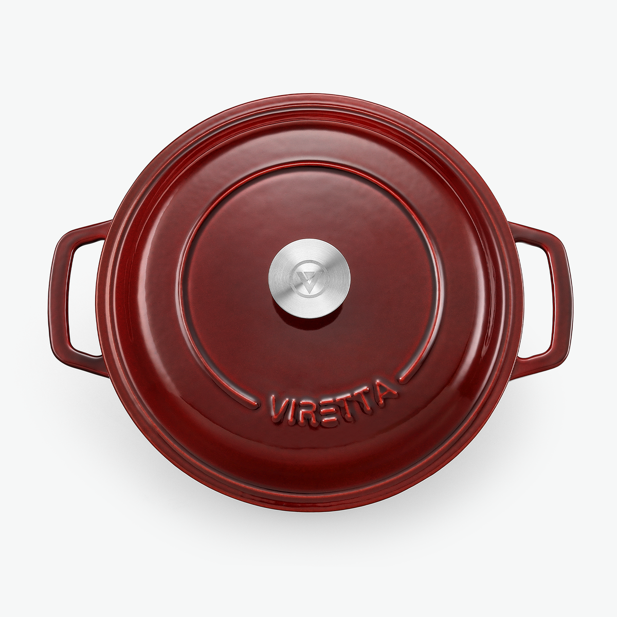 Låget på støbejernsgryden i ribsrød med knop i rustfrit stål og præget logo, set ovenfra