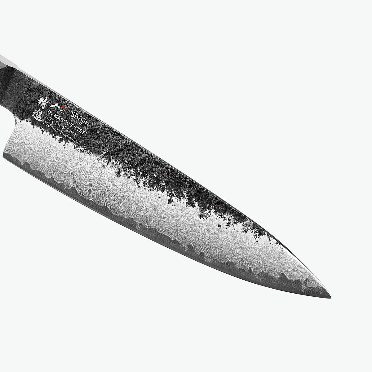 Mørk ryg og damaskmønster på klingen af Shōjin Kashi kokkekniv, tæt på